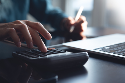accountant using a calculator